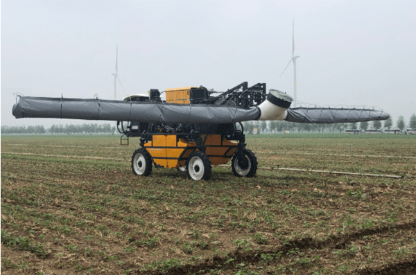 high clearance self-propelled sprayer in farmland